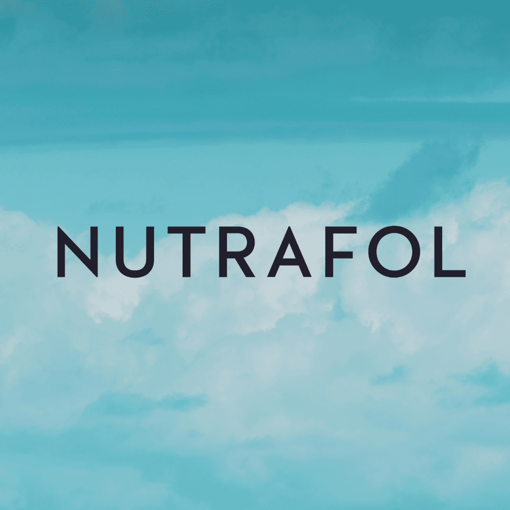 Nutrafol logo against a blue sky with clouds background.