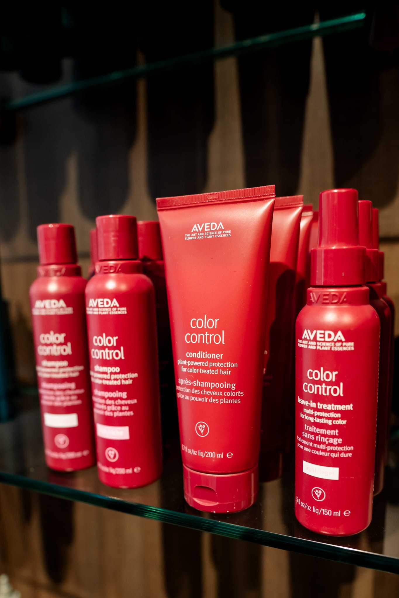 Aveda Color Control hair products on display shelf.