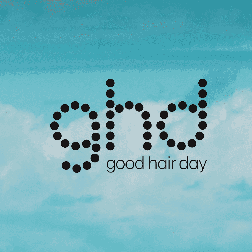 ghd (good hair day) logo with a sky background